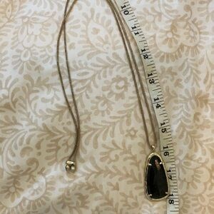 Adjustable 18 inch Kendra Scott neclce with black roughed up stone